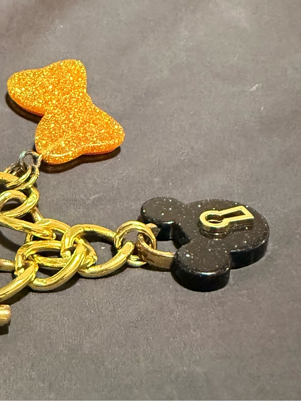 Disney Gold Chain Charm Bracelet with Orange and Black Sparkle Charms